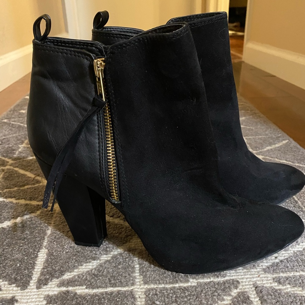 Black vegan suede heeled booties.